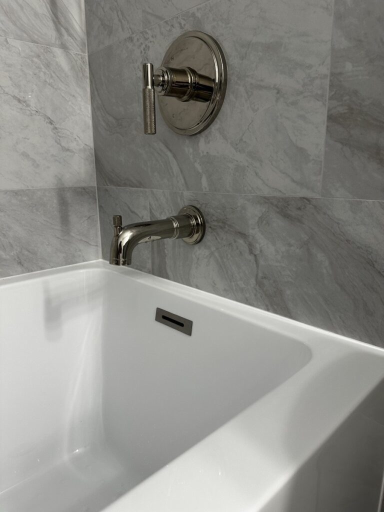 Elegance in Gray: A Bathroom Reborn in Wilmette in Wilmette, IL by ADS Building & Remodeling