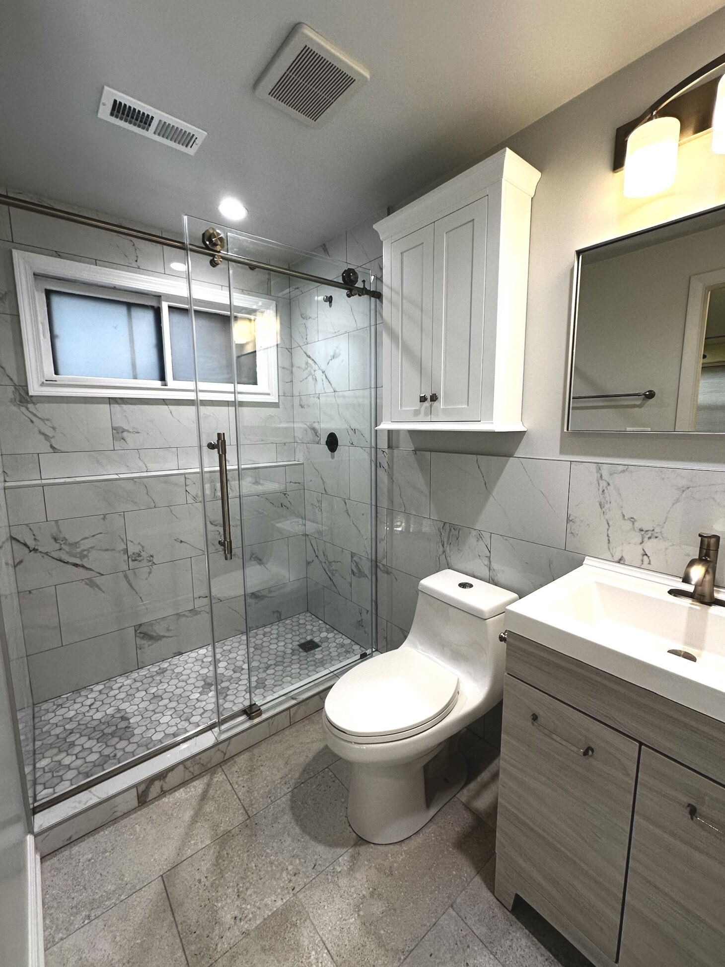 Sleek and Timeless Bathroom Design in Arlington Heights, IL by ADS Building & Remodeling