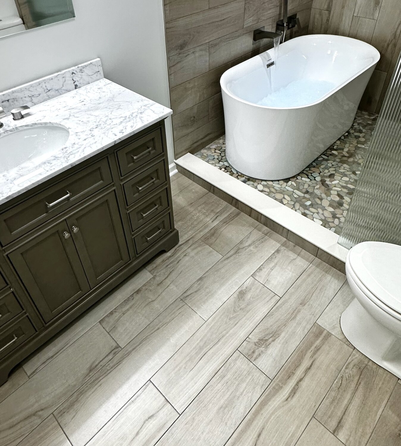 Rustic Spa-Inspired Bathroom in Franklin Park, IL by ADS Building & Remodeling