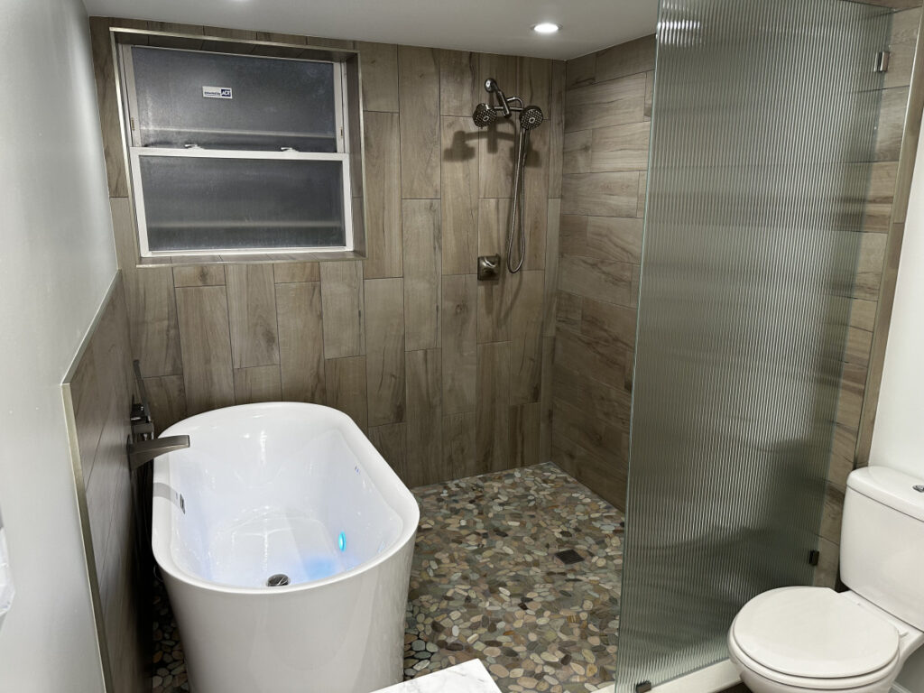 Rustic Spa-Inspired Bathroom in Franklin Park, IL by ADS Building & Remodeling